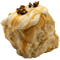 A caramel pecan sweet roll from Kind House Ukraine Bakery.