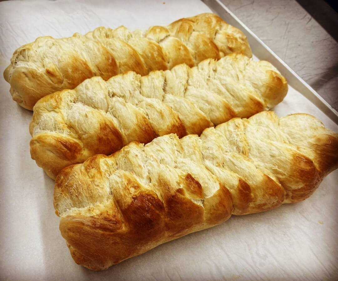 Three loaves of prayer bread from Kind House Ukraine Bakery in Amarillo, TX.
