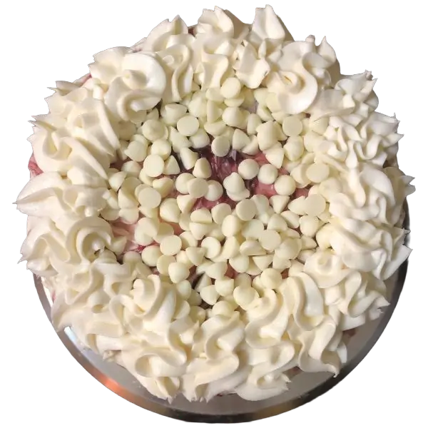 A white chocolate raspberry cake from Kind House Ukraine Bakery.